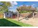 Backyard featuring a tire swing, a garage, a covered patio, seating creating a perfect outdoor retreat at 4645 Quitman St, Denver, CO 80212