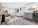 Finished basement area features modern decor, a seating area, and a beverage center at 4645 Quitman St, Denver, CO 80212
