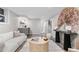 Finished basement area features modern decor, a seating area, and a beverage center at 4645 Quitman St, Denver, CO 80212