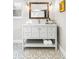 Stylish bathroom featuring a modern vanity with countertop and a decorative mirror at 4645 Quitman St, Denver, CO 80212