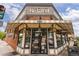 Exterior view of Parisi featuring an inviting corner location, outdoor seating, and unique architectural details at 4645 Quitman St, Denver, CO 80212