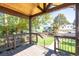 Charming covered front porch offering a relaxing outdoor space with views of the neighborhood at 4645 Quitman St, Denver, CO 80212