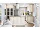 Charming kitchen with granite countertops, stainless steel appliances, and an open view to the living area at 4645 Quitman St, Denver, CO 80212