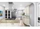 Modern kitchen with stainless steel appliances, granite countertops, and stylish cabinetry at 4645 Quitman St, Denver, CO 80212