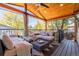 Covered patio featuring comfortable lounge seating, ceiling fan, and inviting outdoor space at 4645 Quitman St, Denver, CO 80212