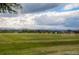 Expansive green field with scenic mountain views, ideal for outdoor activities and recreation at 5250 S Huron Way # 3-205, Littleton, CO 80120