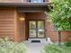 Inviting front entryway with double glass doors, decorative hardware, and cozy welcome mat at 1025 S Butler Way, Lakewood, CO 80226