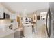 Bright kitchen with an island cooktop and open layout at 1025 S Butler Way, Lakewood, CO 80226