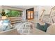 Cozy living room features a bright window and stylish decor at 1025 S Butler Way, Lakewood, CO 80226