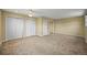 Large bedroom with carpet, closet space, and multiple entryways at 1335 S Kio St, Watkins, CO 80137