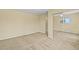 Neutral bedroom featuring carpet floors, natural light, and closet space at 1335 S Kio St, Watkins, CO 80137