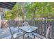 Outdoor patio with seating offers a peaceful outdoor retreat with views of lush greenery at 7893 Allison Way # 101, Arvada, CO 80005