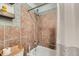 Cozy bathroom showcasing updated tilework and a clean, functional layout for everyday convenience at 7893 Allison Way # 101, Arvada, CO 80005