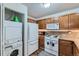Efficient kitchen features full appliances and ample counter space at 7893 Allison Way # 101, Arvada, CO 80005