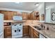 Functional kitchen featuring ample counter space, and modern appliances at 7893 Allison Way # 101, Arvada, CO 80005