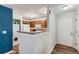 Efficient kitchen with adjacent laundry, and breakfast bar providing an eat-in space at 7893 Allison Way # 101, Arvada, CO 80005