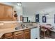 Efficient kitchen space, ample storage, and open view to the dining area, great for entertaining at 7893 Allison Way # 101, Arvada, CO 80005