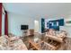 Cozy living room features wood flooring, and an open layout perfect for modern living and entertaining at 7893 Allison Way # 101, Arvada, CO 80005