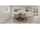 Modern dining area with contemporary furniture and natural light at 2230 Jamaica St, Aurora, CO 80010