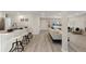 Spacious living room flowing into kitchen, great for entertaining guests at 2230 Jamaica St, Aurora, CO 80010
