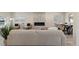 Large open living area with stone fireplace and lots of seating at 2230 Jamaica St, Aurora, CO 80010