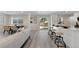 Living room, dining room, and kitchen flow nicely together, great for entertaining at 2230 Jamaica St, Aurora, CO 80010