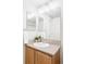 Bathroom vanity with a clean, white sink and plenty of light at 9124 E 29Th Pl, Denver, CO 80238