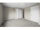 Bedroom featuring spacious closet and a bonus storage space at 2862 W Warren Ave, Denver, CO 80219