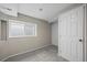 Basement bedroom with egress window and spacious closet at 2862 W Warren Ave, Denver, CO 80219