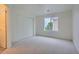 Bedroom with neutral color scheme, plush carpet, closet and bright light from a double window at 22367 Quail Run Dr, Parker, CO 80138