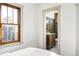 Guest bathroom with green walls and a marble vanity at 4659 Wyandot St, Denver, CO 80211