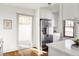 Updated kitchen featuring white shaker cabinets and a large refrigerator at 4659 Wyandot St, Denver, CO 80211