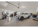 Spacious garage featuring multiple cars and with epoxy flooring at 8518 High Ridge, Castle Pines, CO 80108