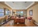 Spacious office with a large unique desk, hardwood floors, and plenty of natural light at 8518 High Ridge, Castle Pines, CO 80108