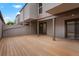 Back patio features a large deck and access from the unit at 6539 Pinewood Dr # 57, Parker, CO 80134