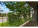 Private balcony overlooking green space and road at 6539 Pinewood Dr # 57, Parker, CO 80134