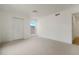 Well-lit bedroom featuring a large window and closet at 6539 Pinewood Dr # 57, Parker, CO 80134