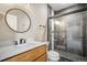 Updated bathroom features a sleek glass shower, modern vanity, and contemporary fixtures at 16088 Denver Pacific Dr, Monument, CO 80132