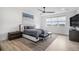 This modern bedroom is bright and well-lit, and offers a calming space to relax and recharge at 3564 Doubletrack Ln, Castle Rock, CO 80108