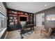 Office space with custom built-in shelving, a work desk, and ample storage, perfect for a productive environment at 3564 Doubletrack Ln, Castle Rock, CO 80108