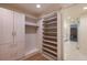 Walk-in closet with custom shelving and storage at 1020 15Th St # 42A, Denver, CO 80202