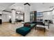 Contemporary lobby with neutral tile flooring, comfortable seating area, and large windows providing natural light at 1020 15Th St # 42A, Denver, CO 80202