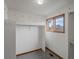 Walk-in closet with gray carpet, white walls, and a window providing natural light at 1792 W Kettle Ave, Littleton, CO 80120