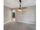 Cozy dining room with decorative lighting fixture and arched entrance ways at 1792 W Kettle Ave, Littleton, CO 80120