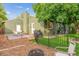 Spacious outdoor space featuring patio, fenced yard and mature shade trees for ideal privacy at 5007 S Richfield Cir, Aurora, CO 80015