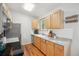 Bright eat-in kitchen with stainless steel appliances, granite countertops, and light wood cabinetry at 5007 S Richfield Cir, Aurora, CO 80015