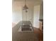 Kitchen granite countertops featuring a double sink and stainless steel appliances at 1441 Central St # 211, Denver, CO 80211