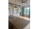 Kitchen granite countertops featuring a double sink and with views to the built-in bookshelves at 1441 Central St # 211, Denver, CO 80211