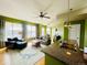 Open floor plan with kitchen views and a comfortable seating arrangement and a large window at 1441 Central St # 211, Denver, CO 80211