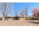Spacious backyard featuring a covered patio area, ideal for outdoor entertaining and relaxation at 2756 E Euclid Ave, Centennial, CO 80121